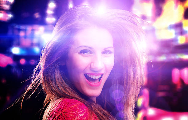 istock Smiling sexy woman dancing at the discoteque 535265129