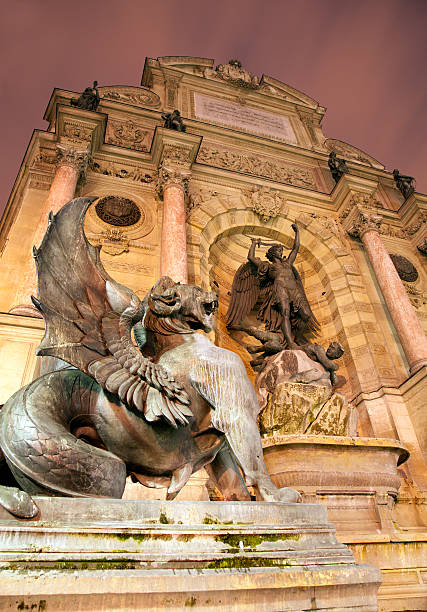 istock Paris - st. Michael fountain in night 535265397