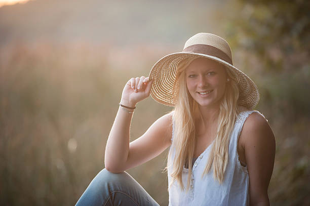 istock Young woman with straw hat 535266237