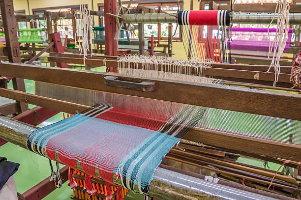 istock Weaving loom and shuttle on the warp. 535266867
