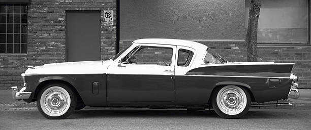 istock Classic automobile in a parking area. Black and white 535275303