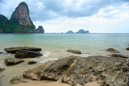 Sea washes the rocky shore of the Andaman Sea