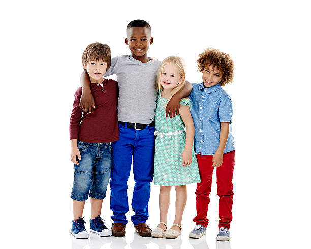 Embracing diversity Studio shot of a group of young friends standing together against a white backgroundhttp://195.154.178.81/DATA/istock_collage/0/shoots/784883.jpg smiling kids on white stock pictures, royalty-free photos & images
