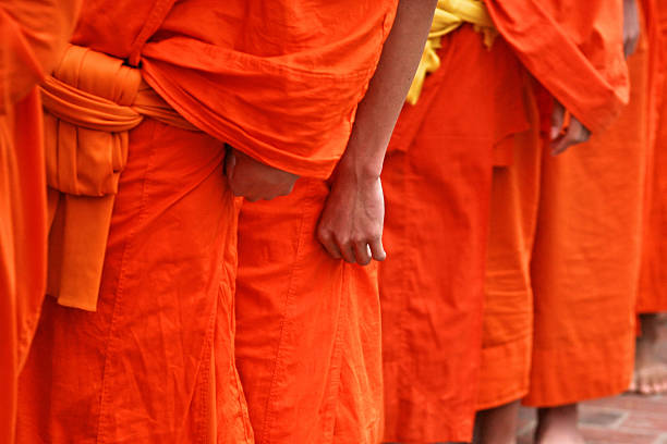 istock Monk waiting in line at Luang Prabang, Laos 535278437