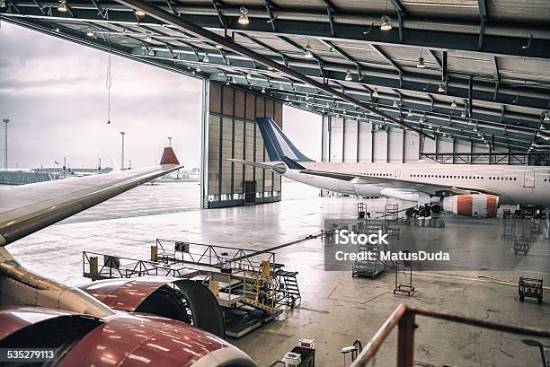 Aircrafts In Hangar Stock Photo - Download Image Now - Repairing, Airplane Hangar, Airplane