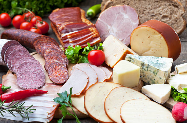 Meat products and cheese stock photo