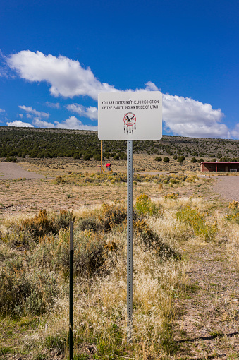 Koosharem, Utah, United States - October 12, 2014: Along the State Highway 24 between Salina and Loa, near Koosharem Reservoir. A sign indicating the entrance to the Paiute Jurisdiction. Koosharem. Utah. United States.