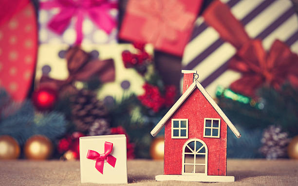 istock Toy house and christmas gifts 535281147