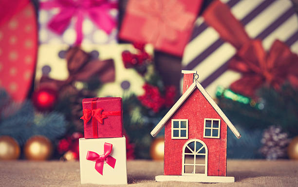 istock Toy house and christmas gifts 535281237