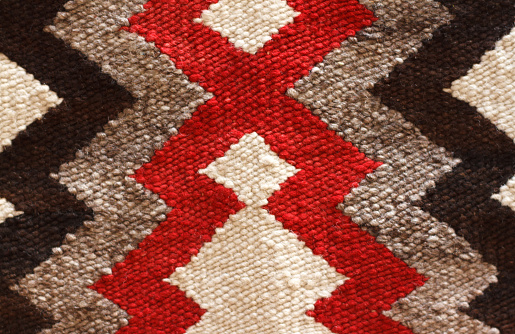 A close-up detail of a 1930s traditional Navajo rug.