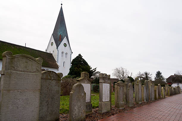  Amrum, Germany - December 31, 2014: In Nebel on the North Frisian Island Amrum in Germany the historic Sailor Tombstones have been restored. They are called speaking Grave Stones