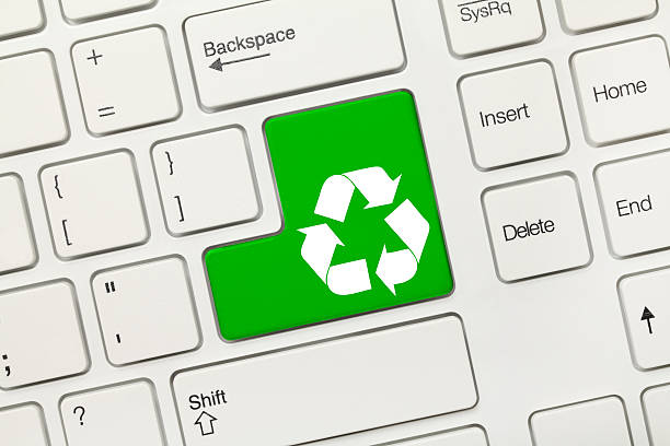 istock White conceptual keyboard - Recycling symbol (green key) 535293737