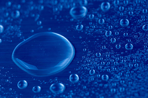 istock Drops of water on blue background 535294699