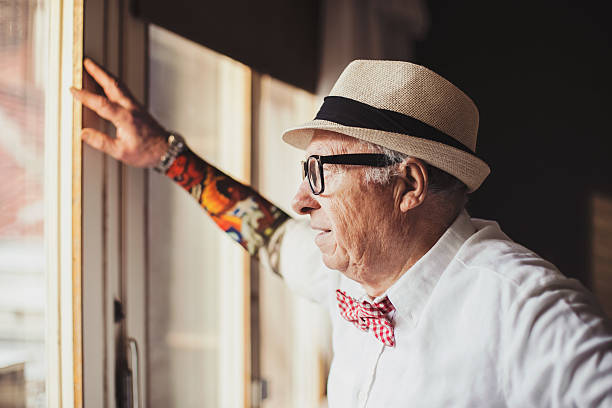 istock Serious senior man with tattoo, tattoo sleeve 535295987