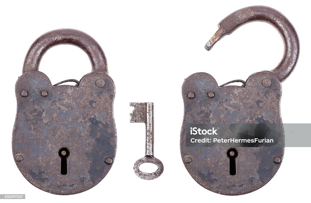 Medieval Padlock With Key Locked and unlocked medieval padlock with key, made of iron and slightly rusty. Portable lock with a shackle that may be passed through an openeing to protect against unauthorized use, theft, vandalism or harm. 2015 Stock Photo