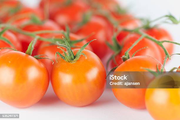 Macro Photo Of Cherry Tomatos Stock Photo - Download Image Now - 2015, Bunch, Cherry Tomato