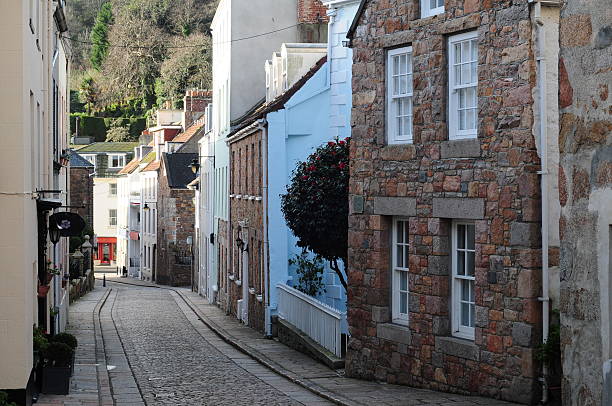 St.Aubin's highstreet, Jersey, U.K. Probably the last original cobbled street left in Jersey. channel islands england stock pictures, royalty-free photos & images