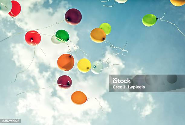 Flying Balloons Stock Photo - Download Image Now - Balloon, Releasing, Sky