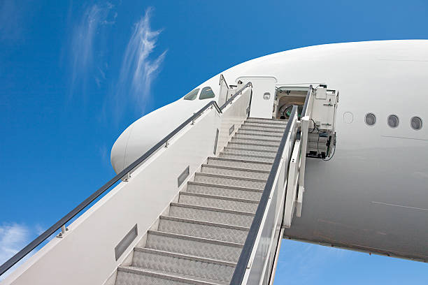 istock Jet airplane stairs, blue sky 535299107