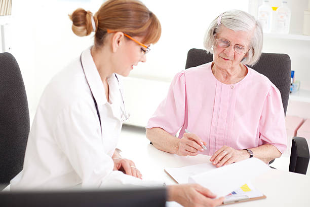 istock Senior woman visiting doctor. 535299121
