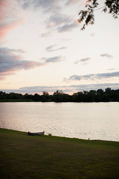 istock Lonely Rowboat on Lakeshore 535299631