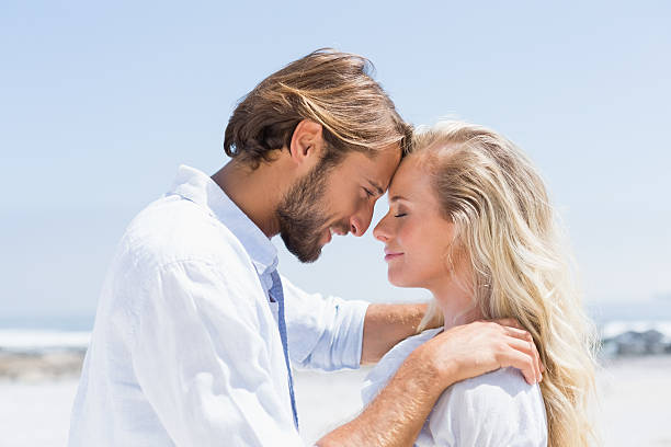 istock Cute couple hugging on the beach 535299723