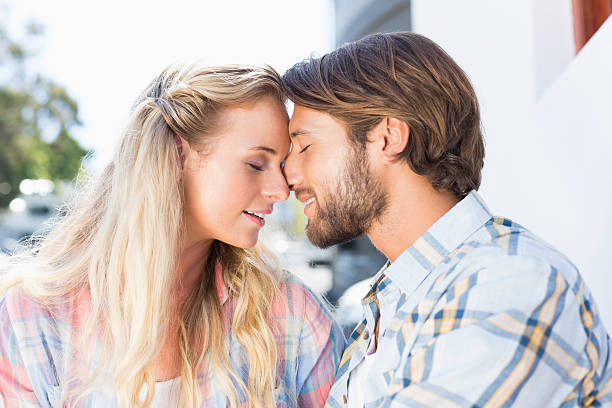 istock Attractive couple sitting on bench 535300201