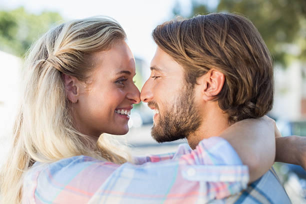 istock Attractive couple standing and hugging 535300315