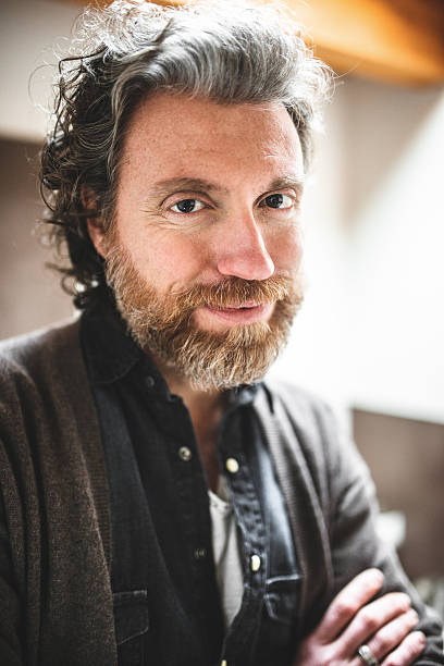 istock pensive mature man with long beard 535300375