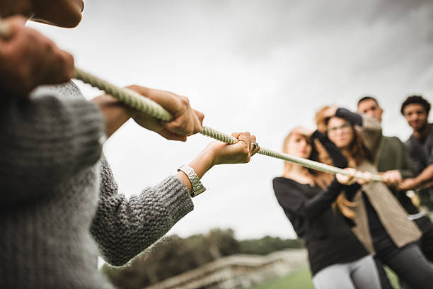 istock Friends doing the Tug of war - teamwork 535300433