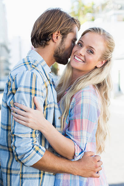 istock Attractive couple standing and hugging 535300541