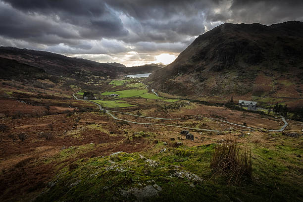 Snowdonia National Park A classic view in Snowdonia, looking down the valley to LLyn Gwynant from the A498. llyn gwynant stock pictures, royalty-free photos & images