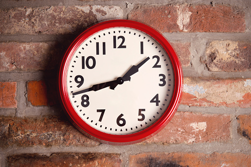 Clock on brick wall