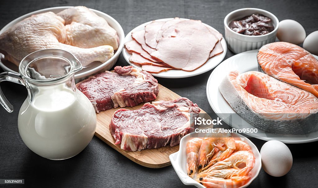 Protein diet: raw products on the wooden background Animal Egg Stock Photo