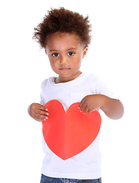 istock Little boy with red heart 535314957