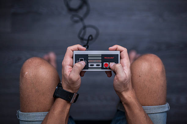 nintendo-entertainment-system-video game controller - nes stock-fotos und bilder