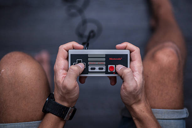 nintendo system rozrywki-gry wideo kontroler - video game joystick leisure games control zdjęcia i obrazy z banku zdjęć