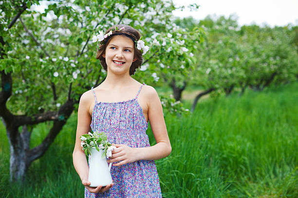 istock Girl in spring garden 535317917