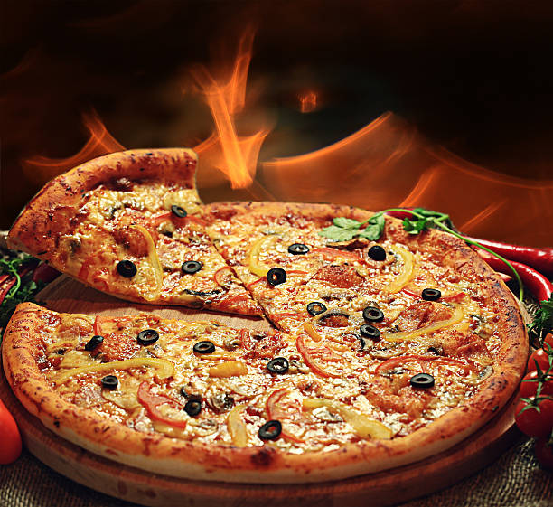 istock pizza with a slice cut, delicious pastries 535318233
