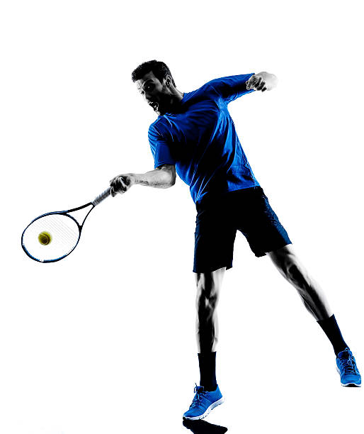 istock man silhouette playing tennis player 535318279