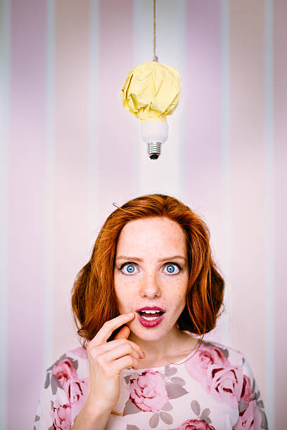 istock Enlightened Woman With Lightbulb Above Head 535318345
