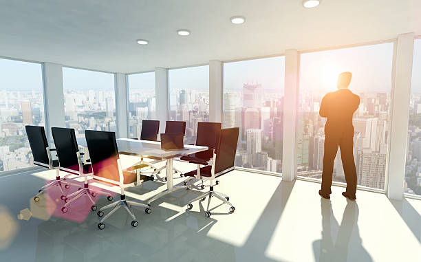 istock Businessman looking outside window, thinking about opportunities 535333487