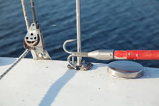 Boathook on deck sailboat