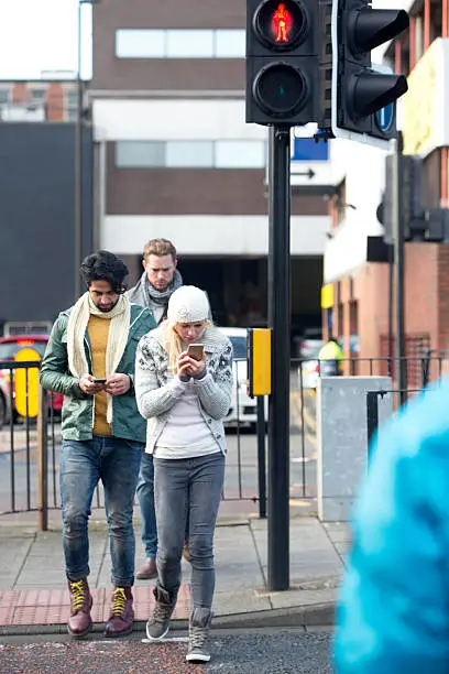 Photo of Using Mobile Telephone While Crossing A Road