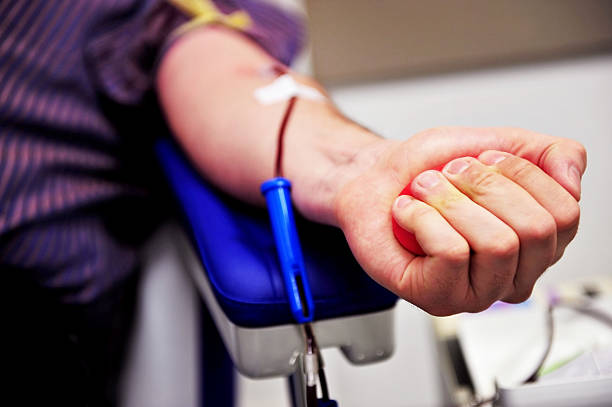 Blood donor hand stock photo