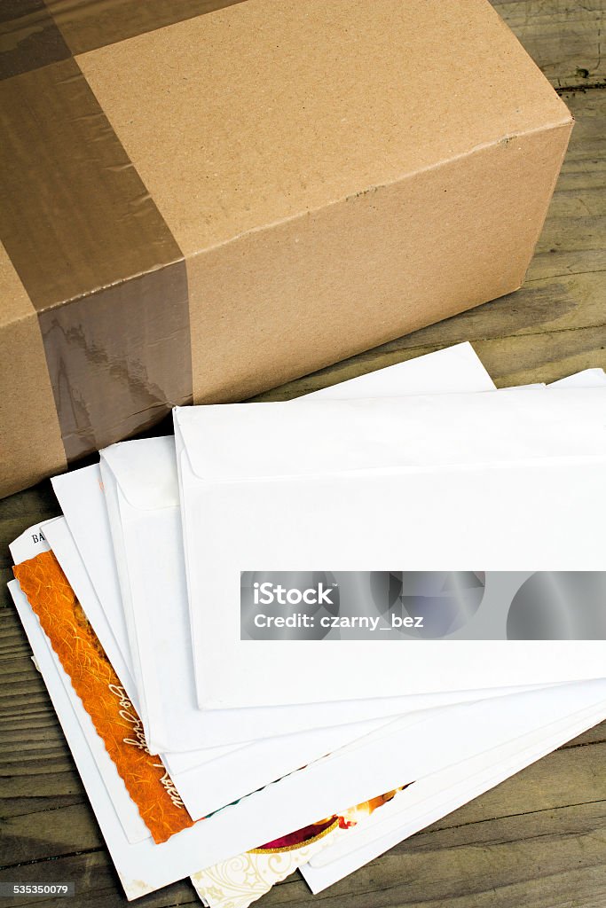 pile of letters and postal parcel a pile of letters and postal parcelpile of letters and postal parcel Mail Stock Photo