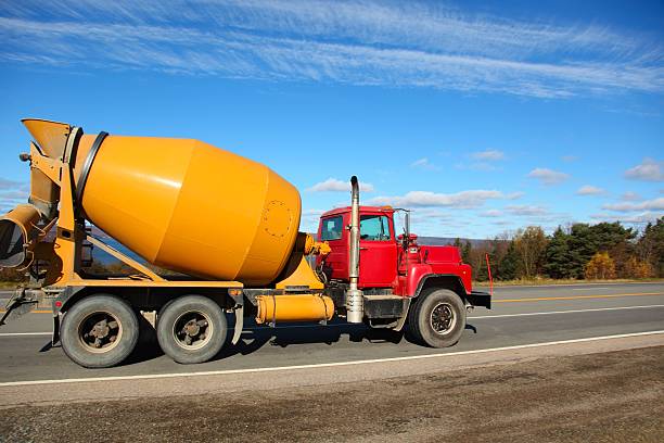 istock Cement truck delivering its load 535350929
