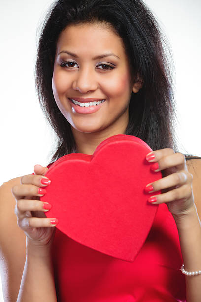istock lovely woman with red heart shaped gift box 535354895