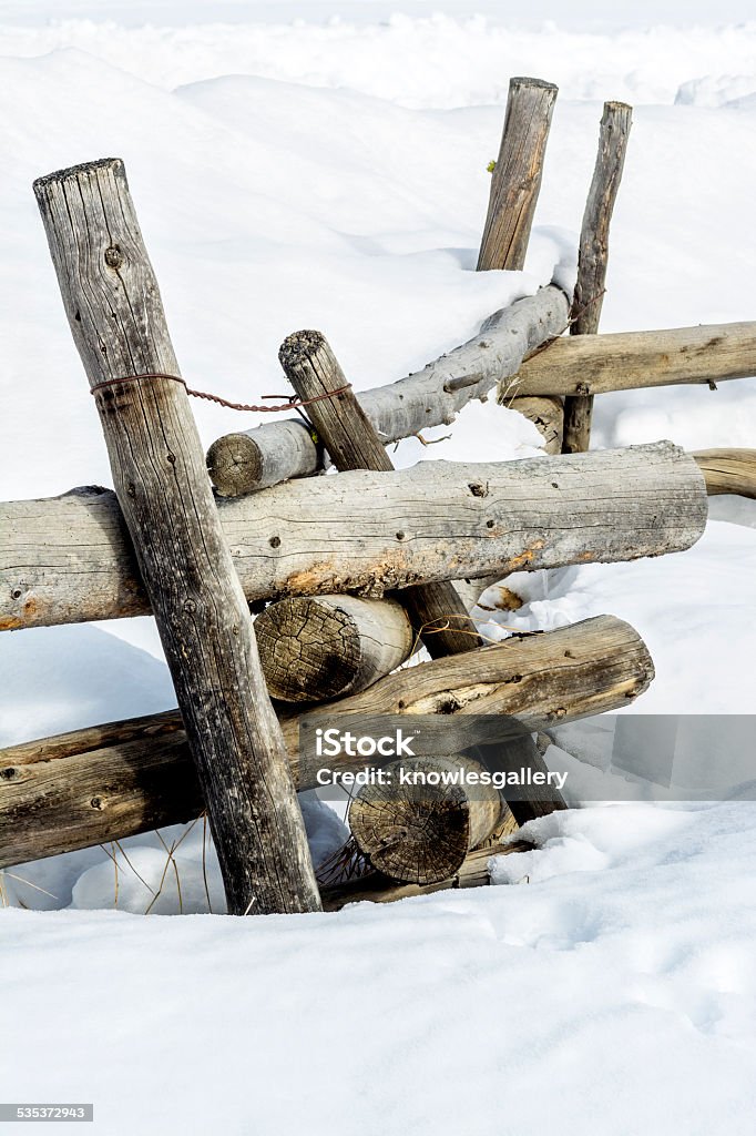 Winter cold an pole fence Rustic wilderness fence post in the snow 2015 Stock Photo