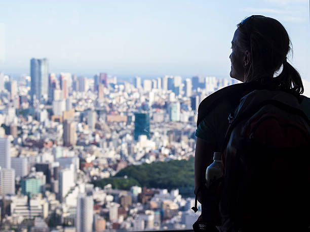 istock Woman enjoing Tokyo skyline 535378209